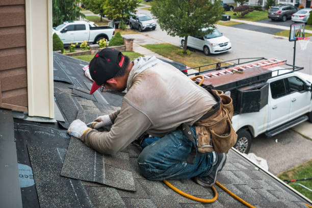 Professional Gutter Repair And Installation technician working in East Livermore, ME